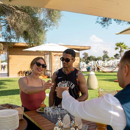 Radisson Blu Resort Al Hoceima Bagian luar foto The Beach Club at the Four Seasons Resort Palm Beach