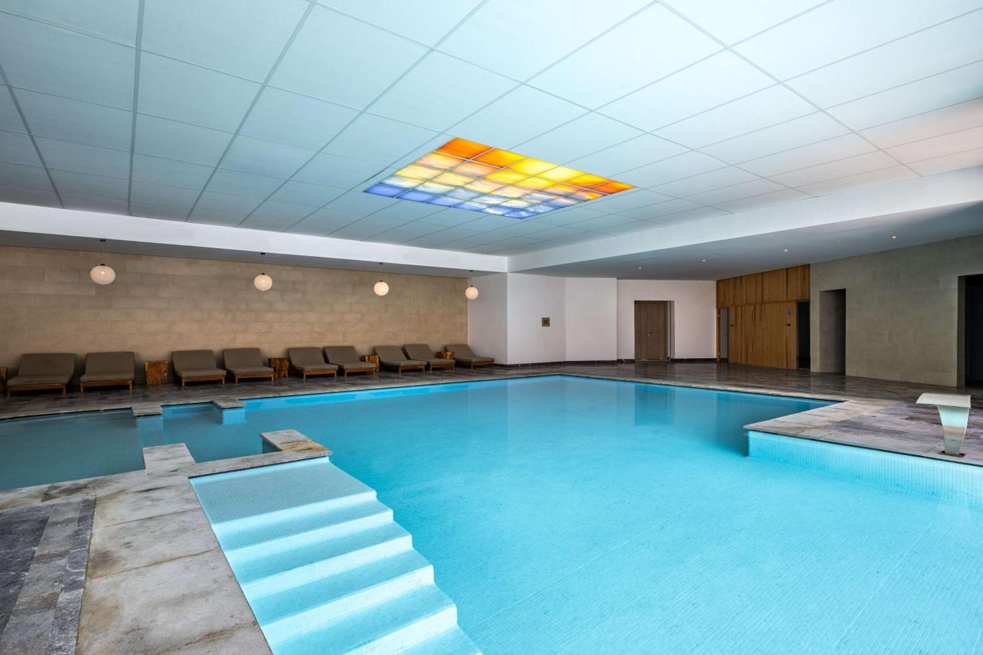 Radisson Blu Resort Al Hoceima Bagian luar foto The swimming pool